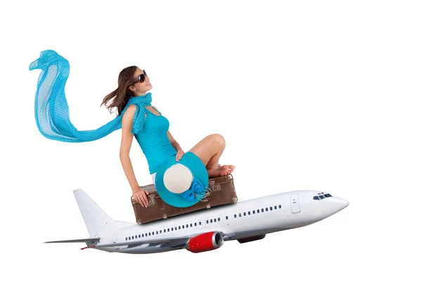 Junge Frau sitzt im Flugzeug — Stockfoto