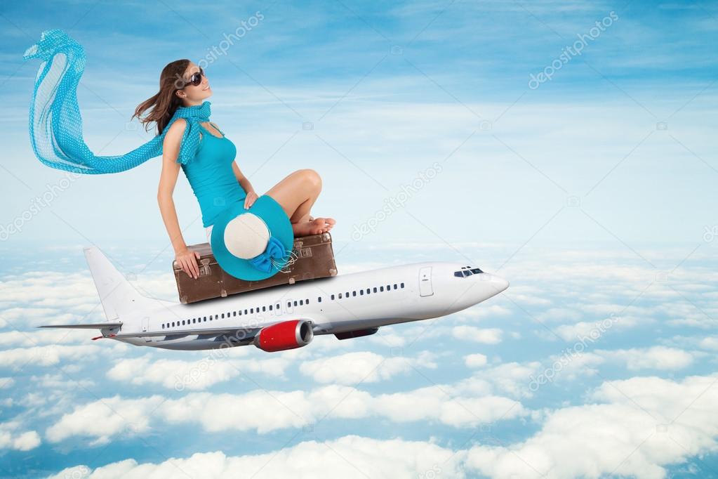 Young woman sitting on airplane