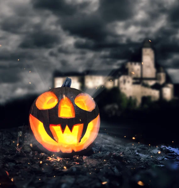 Halloween pumpkin in a forest at night — Stock Photo, Image