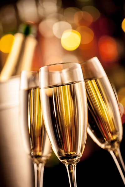 Glasses of champagne on bar counter — Stock Photo, Image