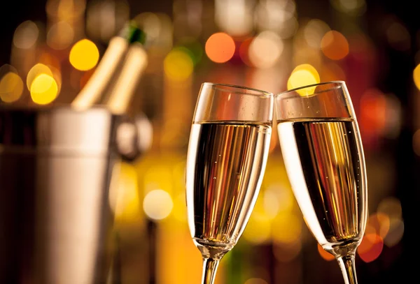 Glasses of champagne on bar counter — Stock Photo, Image