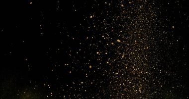 Detailed wave of airborne clay dust swirling in chaotic motion, captured in freeze  motion. Dramatic natural explosion of earthy particles on black background.