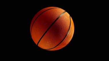 Düşen Basketbol Topunun Süper Yavaş Hareketi. Kara Arkaplan 'da izole edilmiş. Üst Manzara. Yüksek Hız Sinema Kamerası, 1000fps.