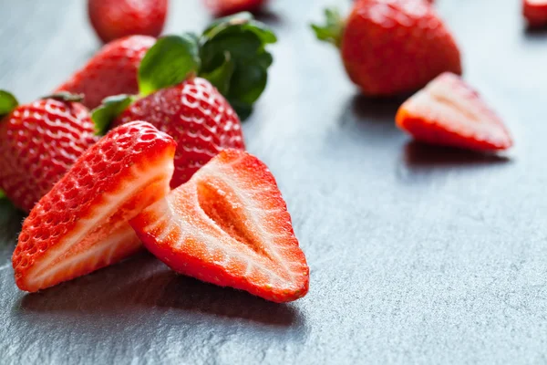 Heap of strawberry on stone — Stock Photo, Image