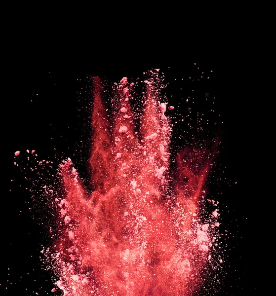 黑色背景下红色粉末的爆炸 — 图库照片