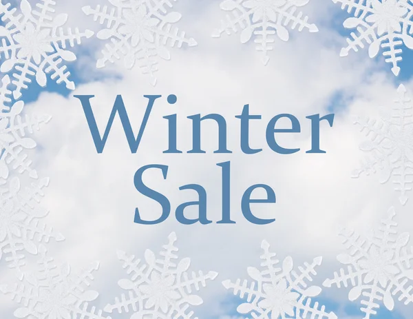 Fundo branco do floco de neve com mensagem da venda do inverno — Fotografia de Stock