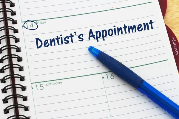 Scheduling your dentist's appointment — Stock Photo, Image