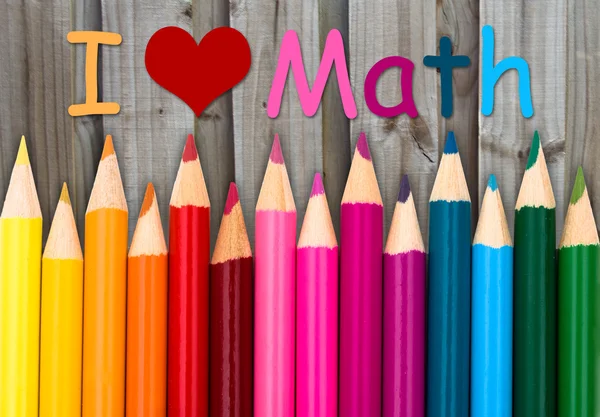 Tužka, pastelky s textem miluju matematiku — Stock fotografie
