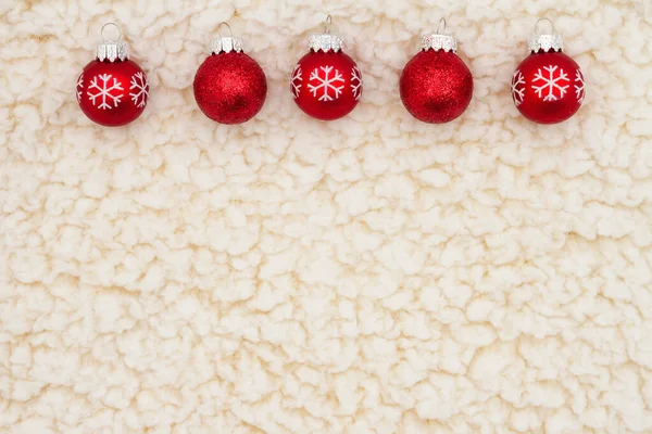 Christmas Red Balls Beige Sherpa Background Copy Space Your Holiday — Zdjęcie stockowe