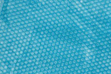 Mavi baloncuk ambalaj malzemesi arkaplanı doku olarak kullanılabilir 