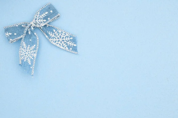 Blue Bow White Snowflake Blue Felt Textured Material Background Copy — Stock Photo, Image