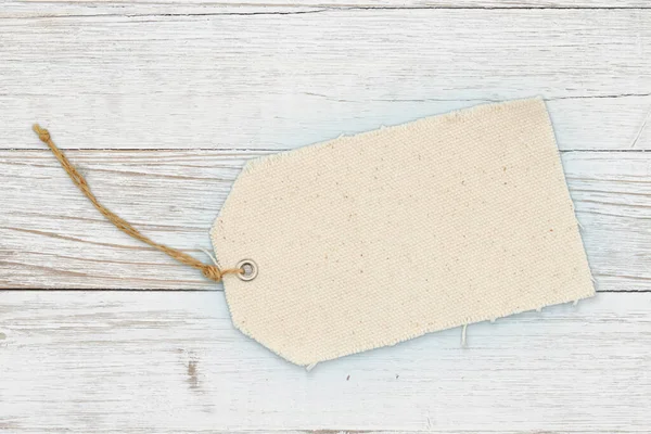Blank Cloth Gift Tag Weathered Wood Copy Space Your Message — Stock Photo, Image
