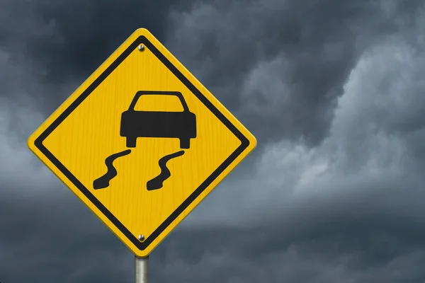 Icy roads and black warning USA highway sign with stormy sky with copy space for your message