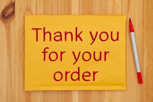 Thank You Your Order Message Yellow Bubble Mailing Envelope Pen Rechtenvrije Stockfoto's