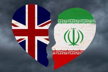 Fırtınalı bir arka planda kırık bir kalple İngiliz ve İran bayrakları