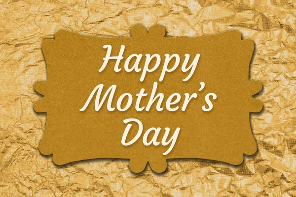 Happy Mothers Day message on gold glitter greeting card with golden sparkle