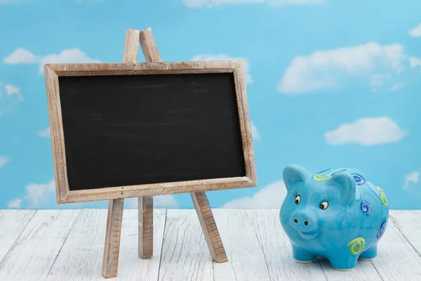 Blank Standing Chalkboard Piggy Bank Weathered Wood Clear Sky Copy — Stock Photo, Image