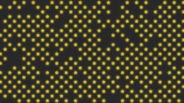 Siyah arkaplanda altın yıldızlar yanıp sönüyor. Tekrar eden ve kusursuz döngüler oluşturan.