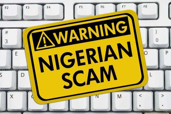 Nigerian Scam Warning Sign — Stock Photo, Image