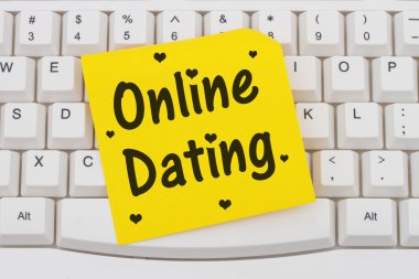 Online Dating, computer keyboard and sticky note