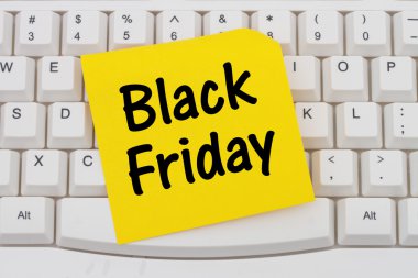Online shopping on Black Friday, computer keyboard and sticky no