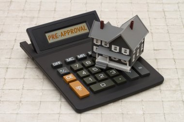Ana sayfa ön onayı, gri ev ve taş hesap makinesi Mortgage