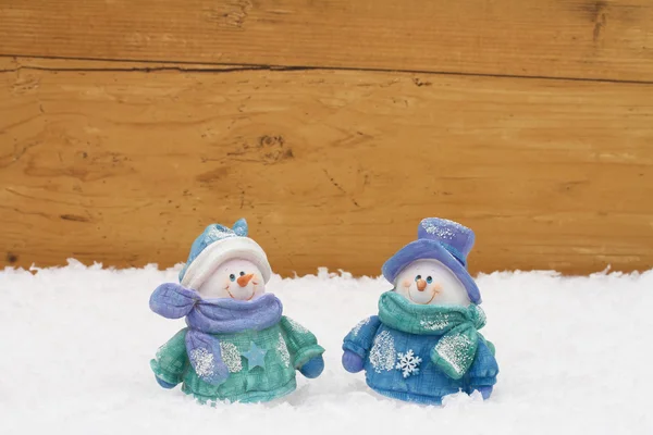 Muñecos de nieve de Navidad con espacio de copia —  Fotos de Stock