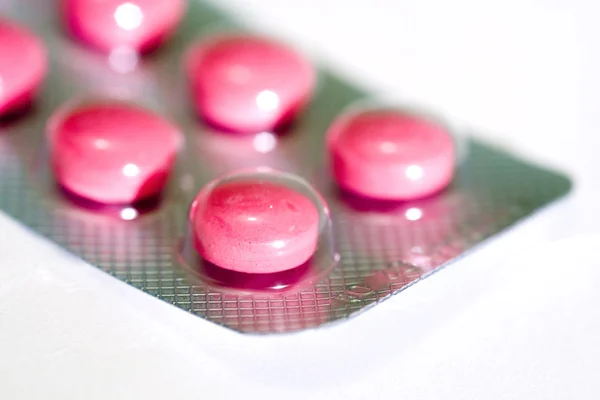 Pink pills close up — Stock Photo, Image