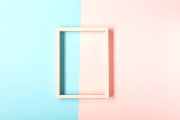 Diseño del marco de fotos con sombra sobre fondo pastel rosa y azul —  Fotos de Stock