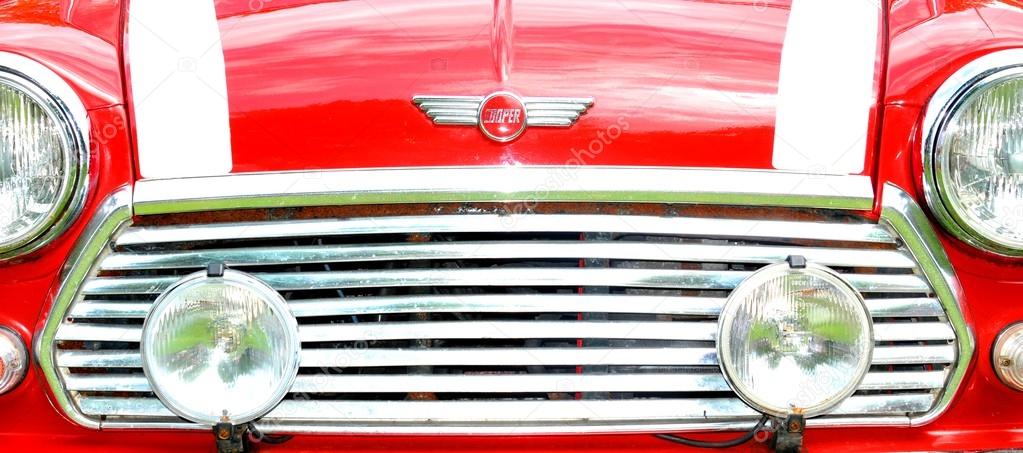 NOTTINGHAM, UK. JUNE 1, 2014: Frontal view of a red Mini Cooper vintage car for sale in Nottingham, England.