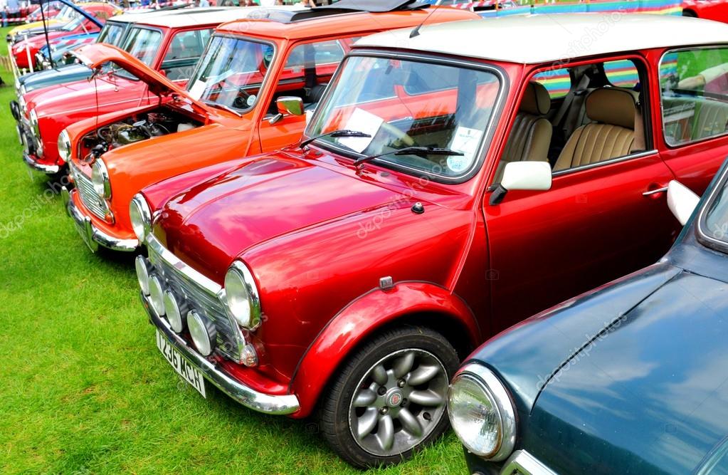 NOTTINGHAM, UK. JUNE 1, 2014: Row of Mini Cooper vintage car for sale in Nottingham, England.