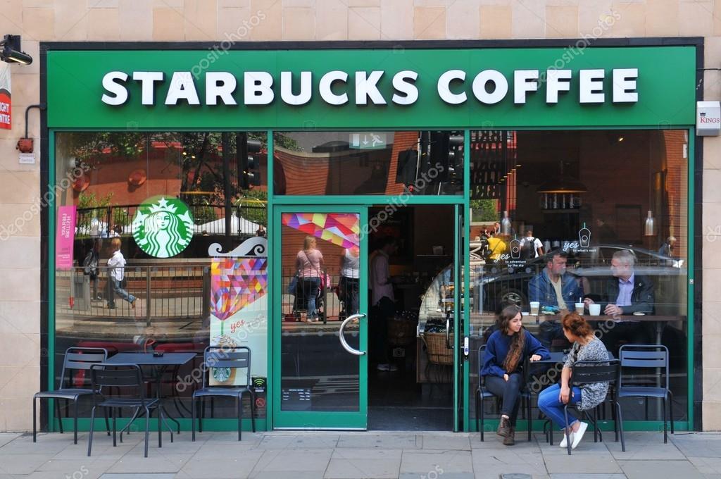 LONDON, UK. JULY 9, 2014: Entrance to Starbucks coffee shop in Central London