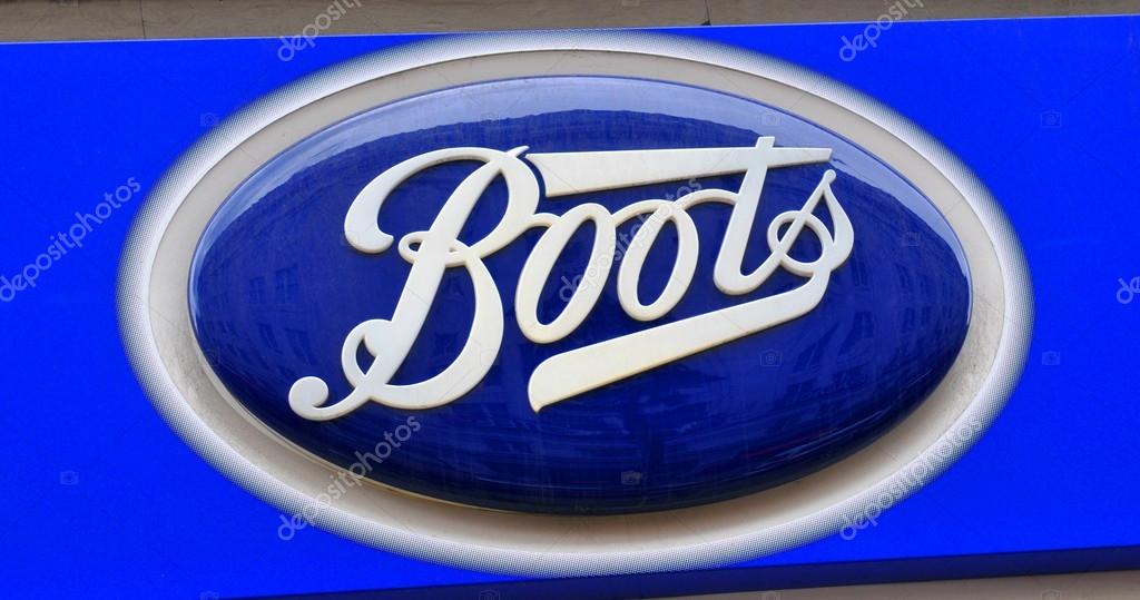 LONDON, UK. JULY 9, 2014: Close up of Boots logo. Boots is a major pharmacy chain in the UK and Ireland, with outlets in most high streets, shopping centres and airport terminals.