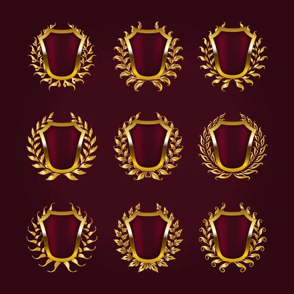 Escudos con corona de laurel — Vector de stock