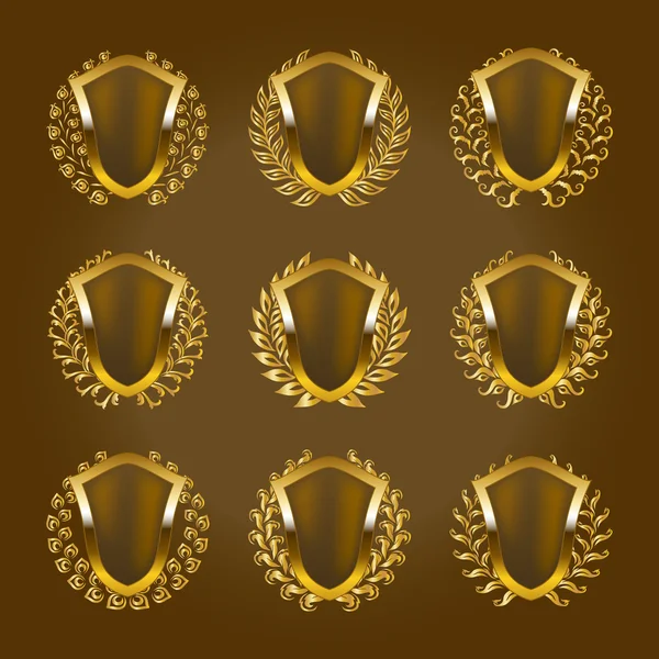 Escudos con corona de laurel — Vector de stock