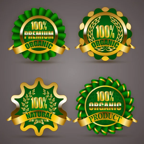 Badges dorés avec couronne de laurier — Image vectorielle