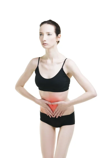 Mujer con dolor abdominal. Dolor en el cuerpo humano aislado sobre fondo blanco —  Fotos de Stock