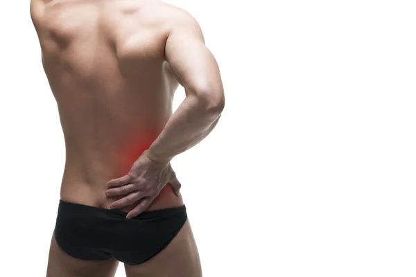 Dolor renal. Hombre con dolor de espalda. Dolor en el cuerpo humano. Cuerpo masculino muscular. Aislado sobre fondo blanco —  Fotos de Stock