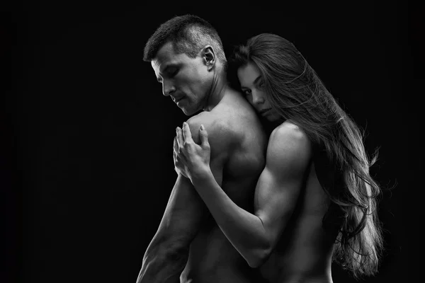 Çıplak seksi çift. Sanat fotoğraf genç yetişkin erkek ve kadın. Yüksek karşıtlık siyah beyaz kas çıplak vücut