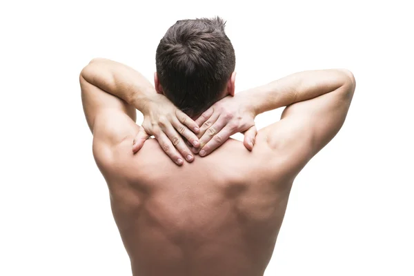 Dolor en el cuello. Hombre con dolor de espalda. Cuerpo masculino muscular. Aislado sobre fondo blanco —  Fotos de Stock