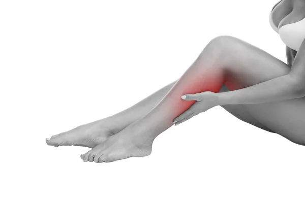 Біль у м'язах телят жінки, масаж жіночих ніг, біль у тілі людини ізольовані на білому тлі — стокове фото
