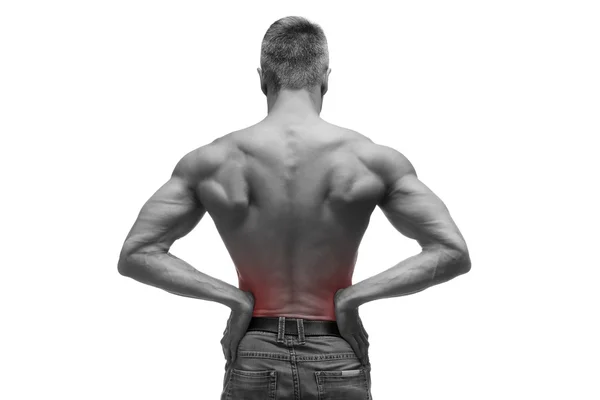 Uomo di mezza età con dolore ai reni, corpo maschile muscolare, studio isolato girato su sfondo bianco con puntino rosso — Foto Stock