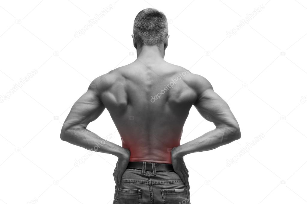 Middle aged man with pain in the kidneys, muscular male body, studio isolated shot on white background with red dot