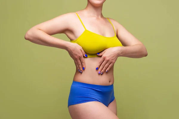 Woman Yellow Top Bra Big Natural Breasts Blue Background Body