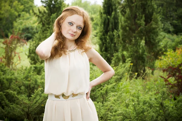 Portrait of redhead girl on nature — Stock Photo, Image