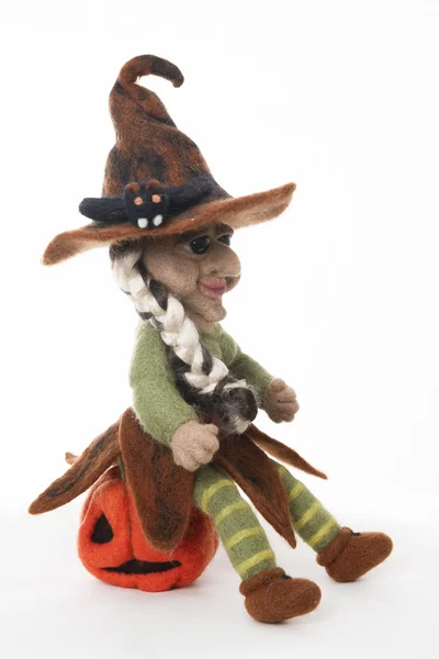 Witch with pumpkin- a toy as a gift for halloween — Stock Photo, Image