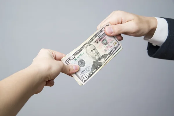 Money in the hands of the people — Stock Photo, Image