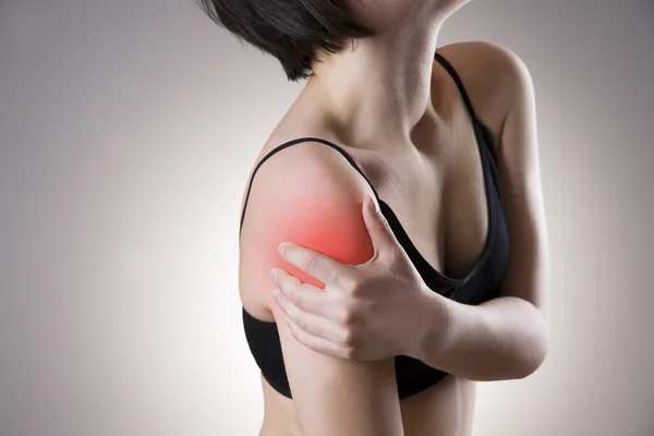 Pain in the women's shoulder — Stock Photo, Image