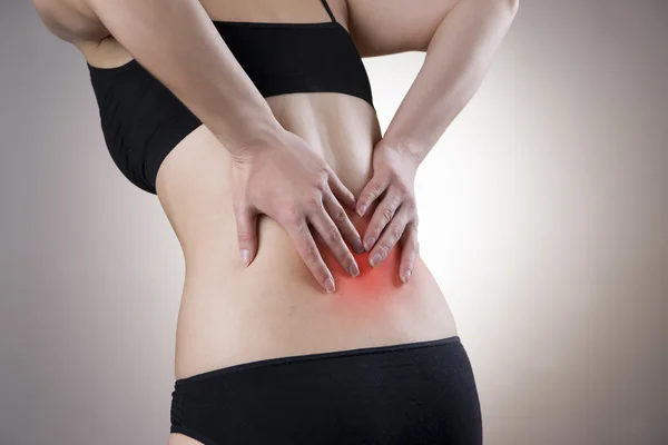 Pain in back of women — Stock Photo, Image