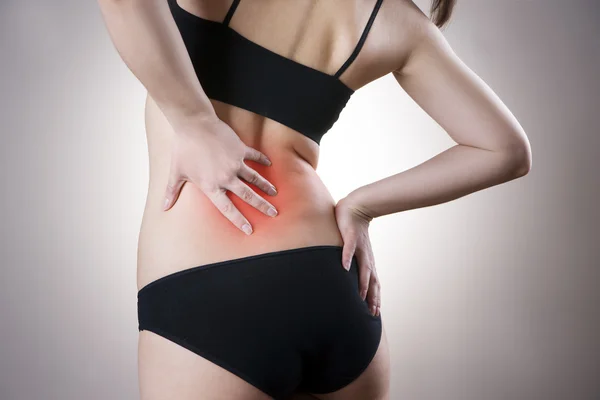 Pain in back of women — Stock Photo, Image